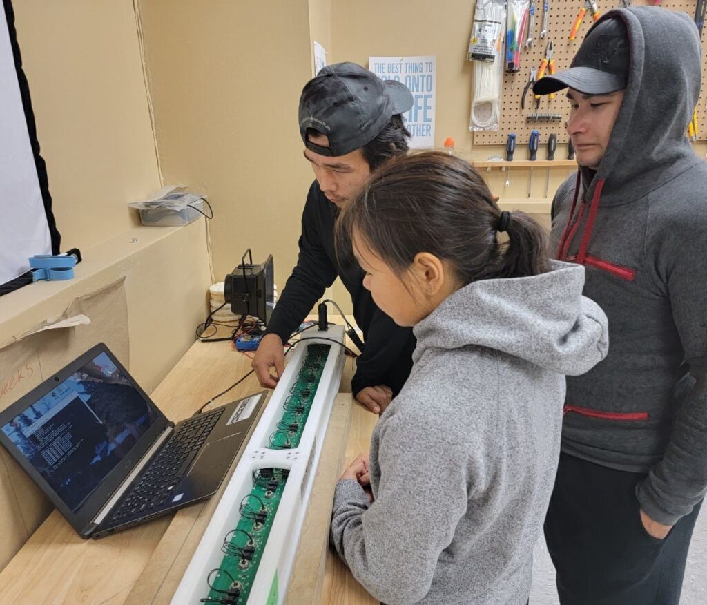 Northern team programming and testing a SmartBUOY. 